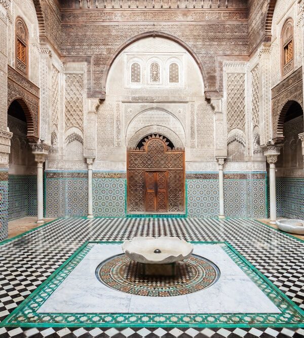 This image captures the historic Ben Youssef in Marrakech old medina, showcasing its architectural beauty and cultural significance.