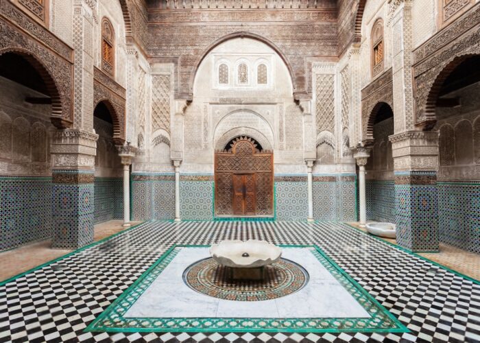This image captures the historic Ben Youssef in Marrakech old medina, showcasing its architectural beauty and cultural significance.