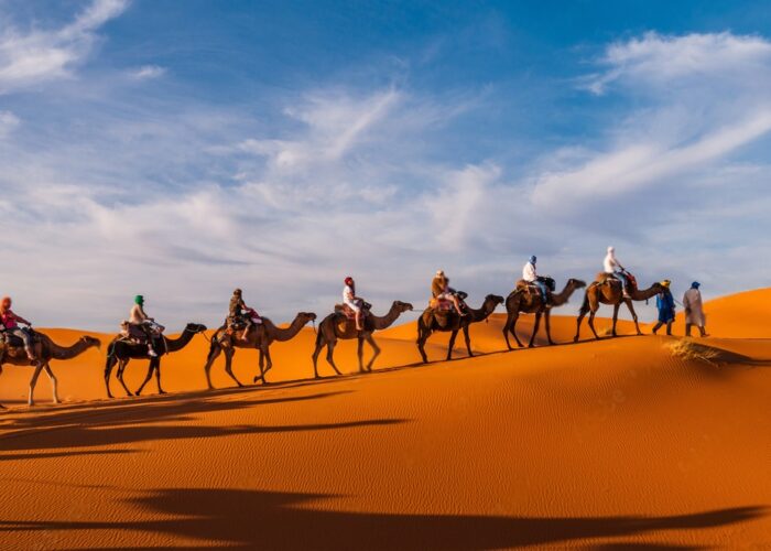 Camel trekking adventure in the Merzouga Sahara during the overnight Marrakech desert tour to Fes